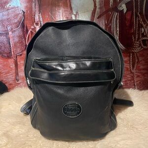 Roots leather backpack